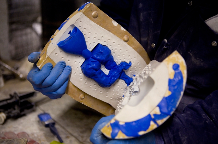 Removing wax model from the mold