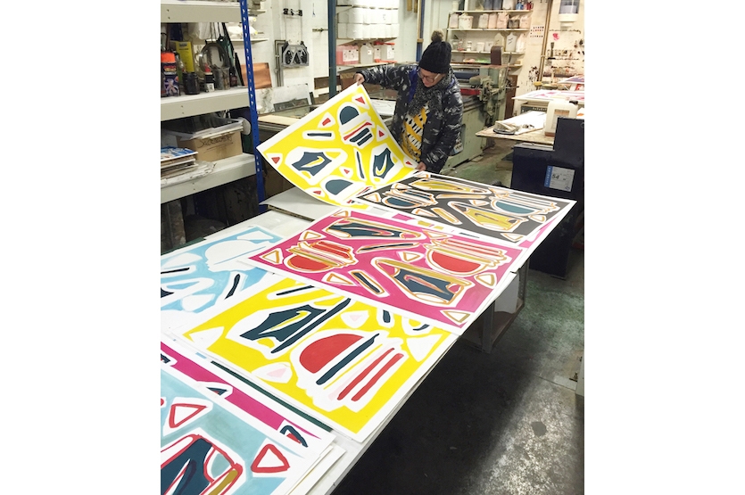 Assessing the progress of the prints at varying stages of completion