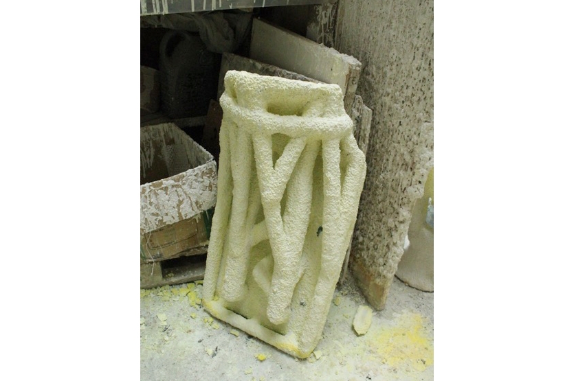 The tubes through which bronze will flow to fill the ceramic mould 