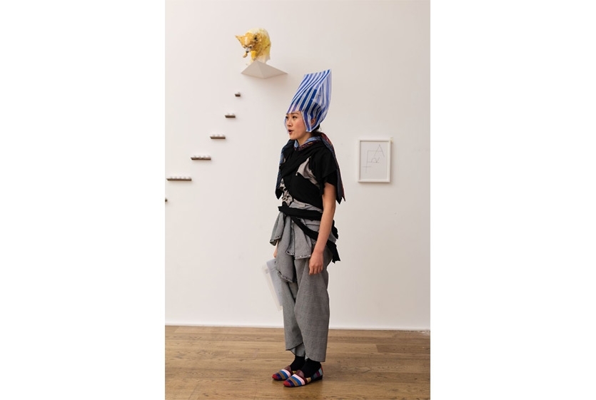 A performer sings at ‘Martin Creed. Toast’ solo exhibition, 2018