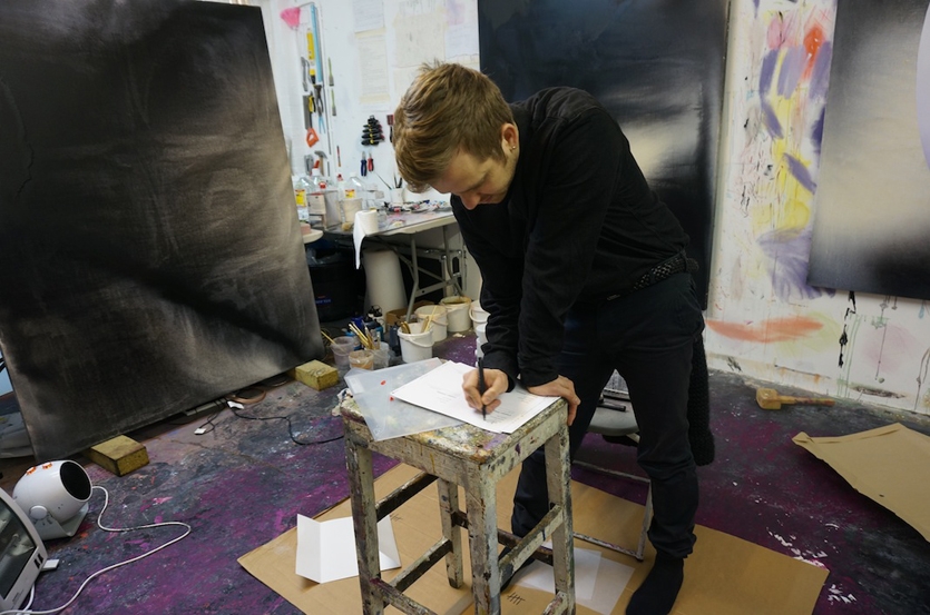Eddie signing the edition certificates in his studio 
