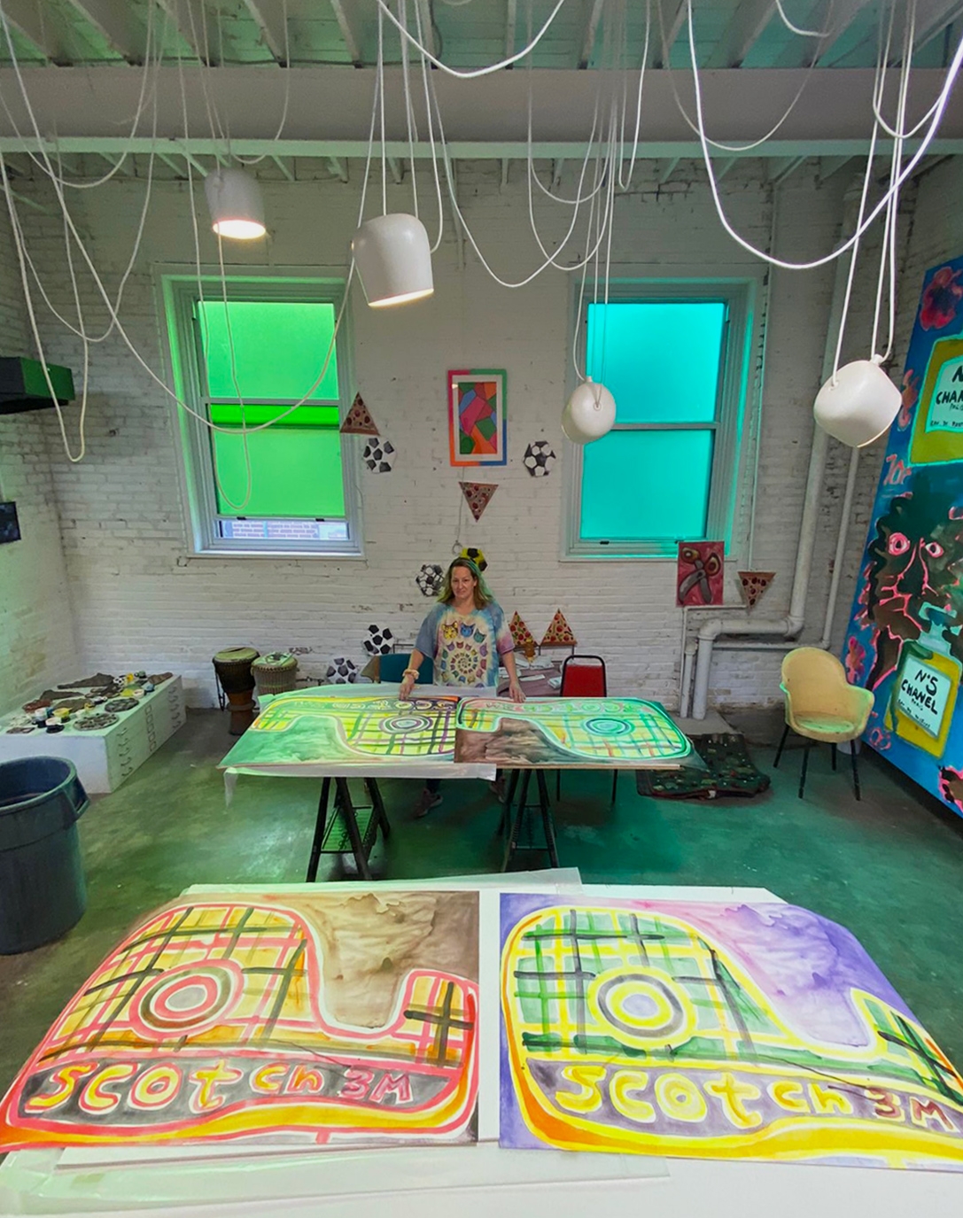 Katherine signs Scotch Magic Tape prints in her Saint Louis studio, 2021.