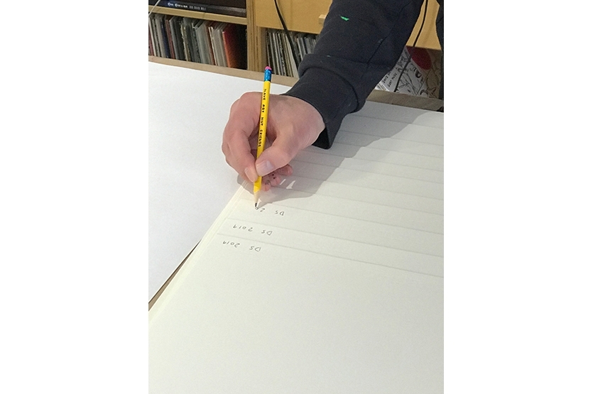 David Shrigley hand signs and dates every edition, May 2019