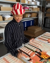 Cassi Namoda signing her edition in Counter Studio, Margate