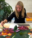Clare Woods painting acrylic on to each edition in Counter Studio, Margate