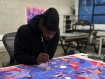Adeniyi-Jones working on his print at Counter Studio, Margate