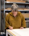 Anya Gallaccio signing her edition at Counter Studio in Margate