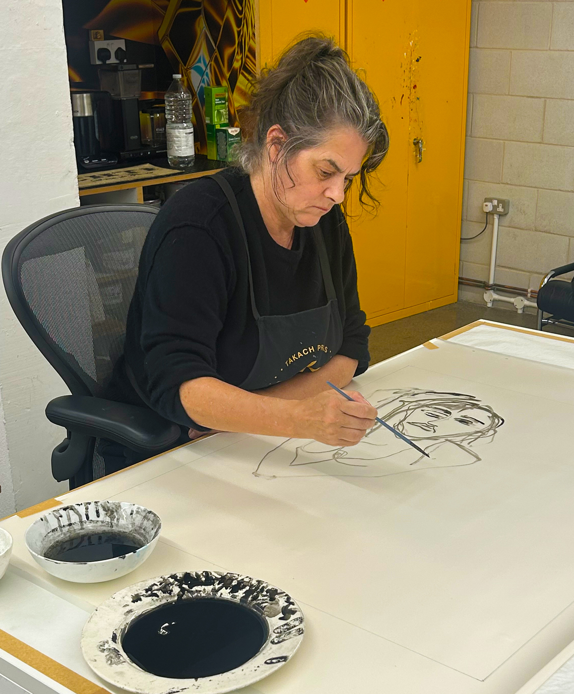Tracey Emin working on her edition at Counter Studio in Margate