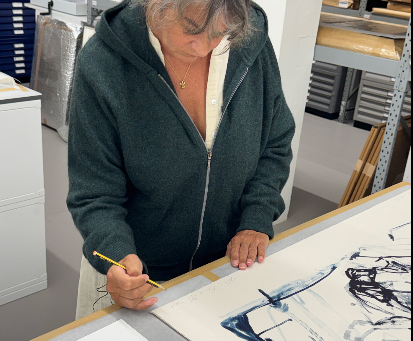 Tracey Emin signing her edition at Counter Studio in Margate