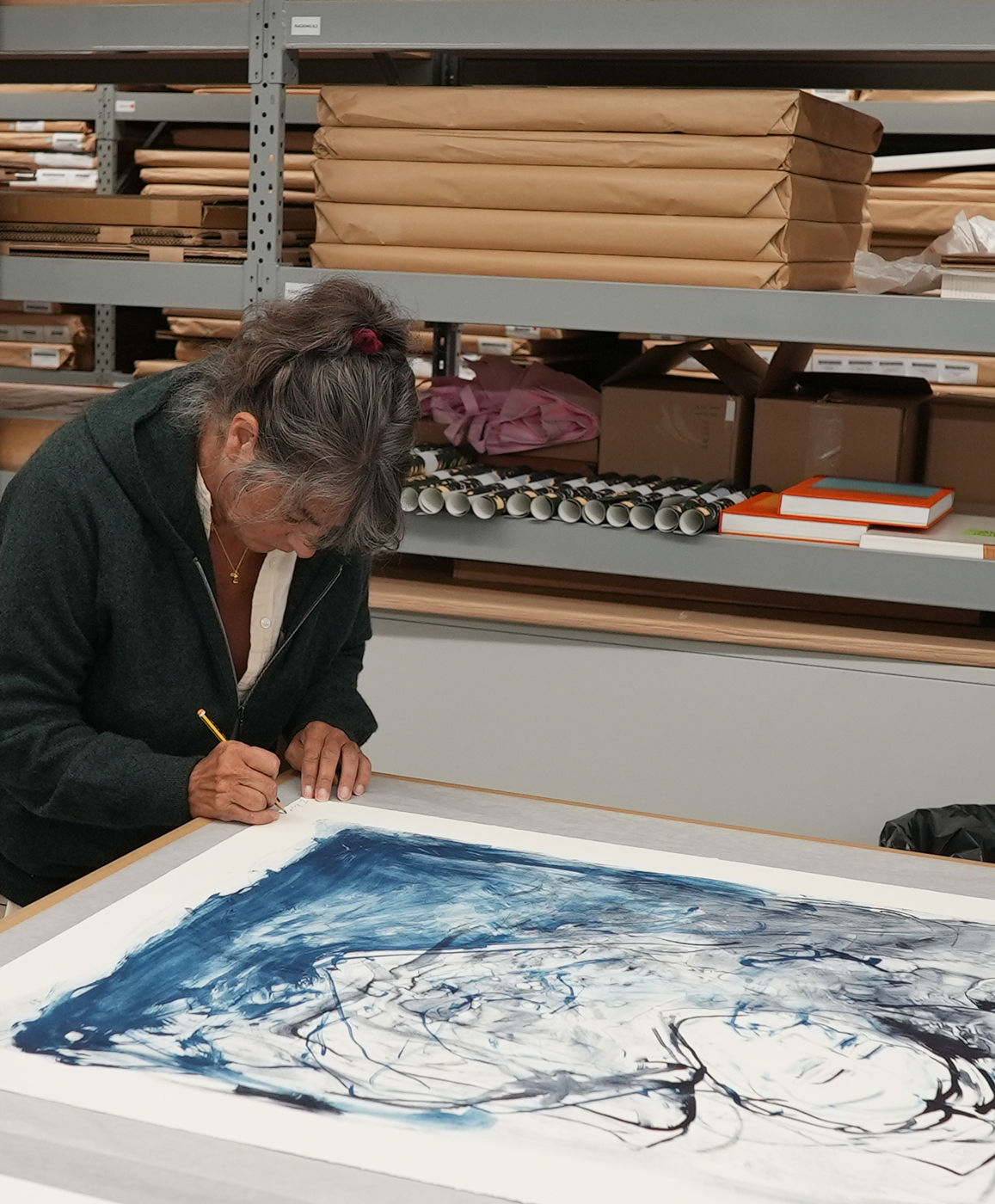 Tracey Emin signing her edition at Counter Studio in Margate