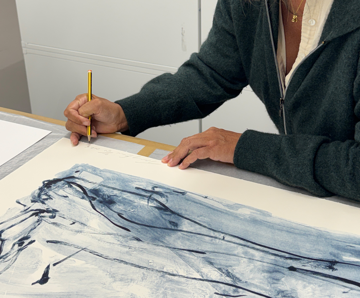 Tracey Emin signing her edition at Counter Studio in Margate