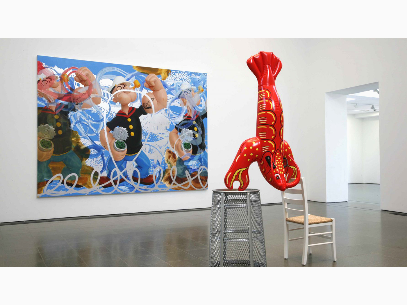 Koons poses here with one of his playful 'Balloon Dog' sculptures which are among the most iconic works of contemporary art in the 21st Century. In 2013, one of his 10-foot-tall Balloon Dog's was purchased for $58.4 million at Christie’s, setting a new record for the most expensive work ever sold at auction by a living artist.