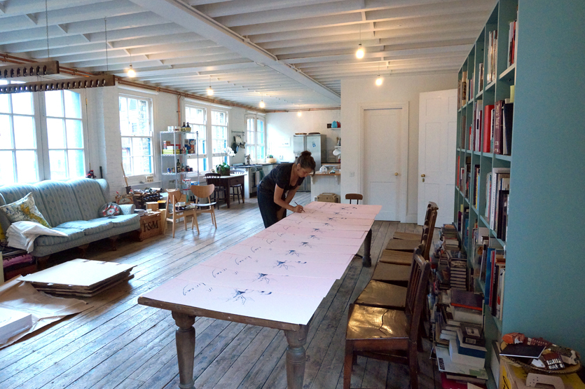 Tracey signing the editions at her studio