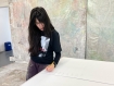 Mandy El-Sayegh signing her print