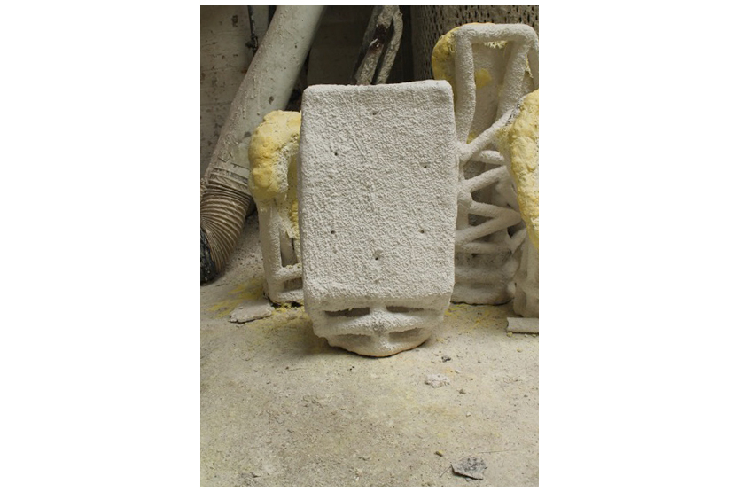 A ceramic mould formed around a wax replica of the found cardboard fragment