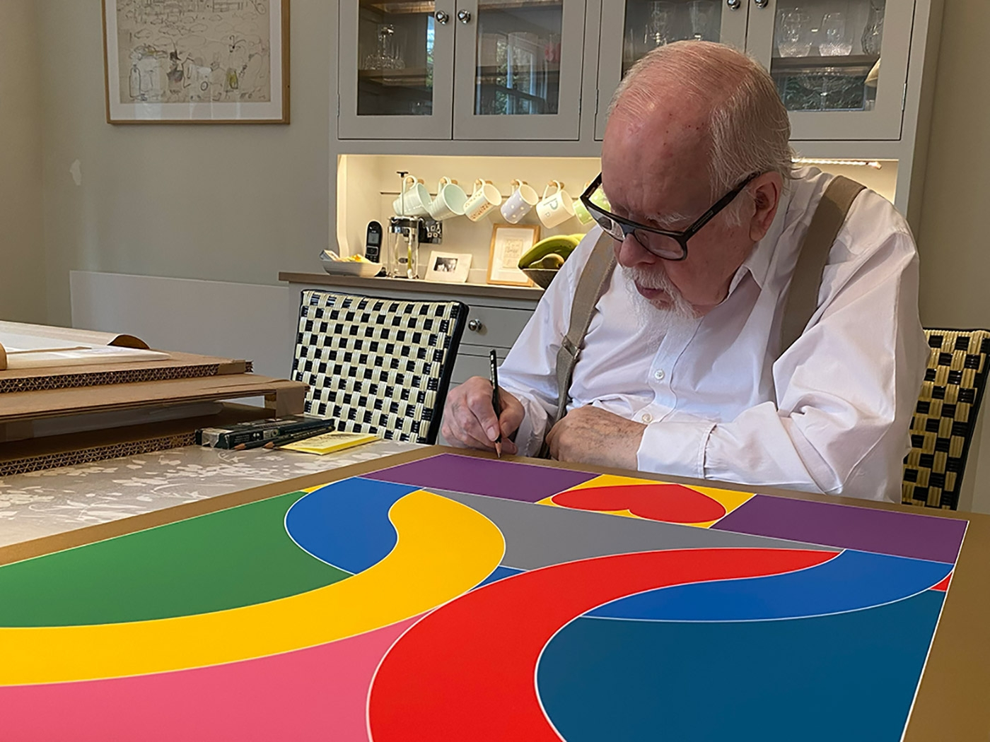 Peter signing his print at his home in London (2020)