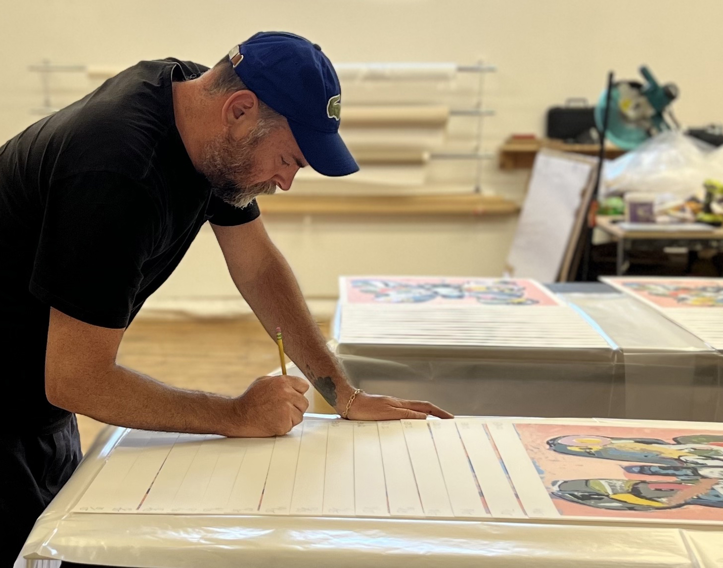 Eddie Martinez signing his prints for GREENPEACE 50 YEARS © Justin Robinson
