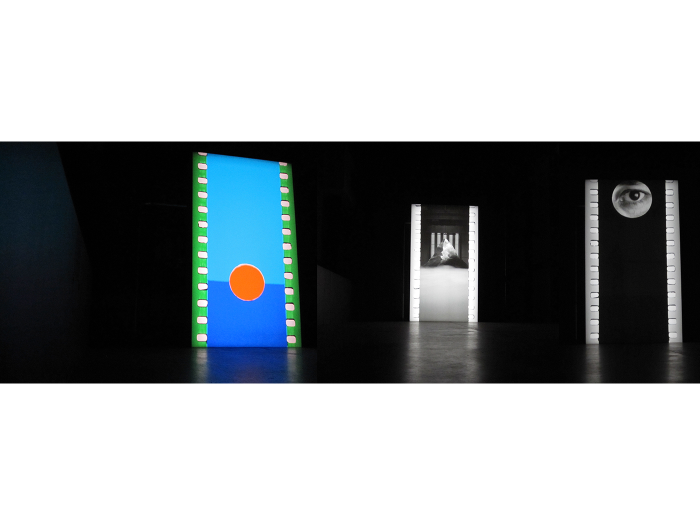 Still from 'FILM' (2011). 'FILM' was specifically commissioned in 2011 as part of the Unilever Series for the Tate Modern’s Turbine Hall. Images are juxtaposed in the film with panels of colour. Dean continues to return to imagery of lightning, trees and seascapes often referencing these in her work.)