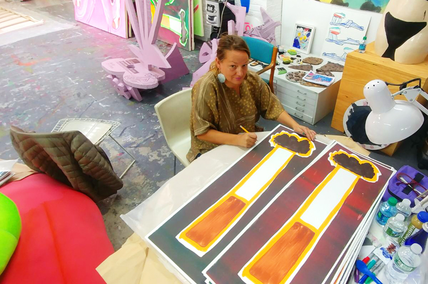 Katherine Bernhardt signing the unique prints at her studio in Brooklyn, NY