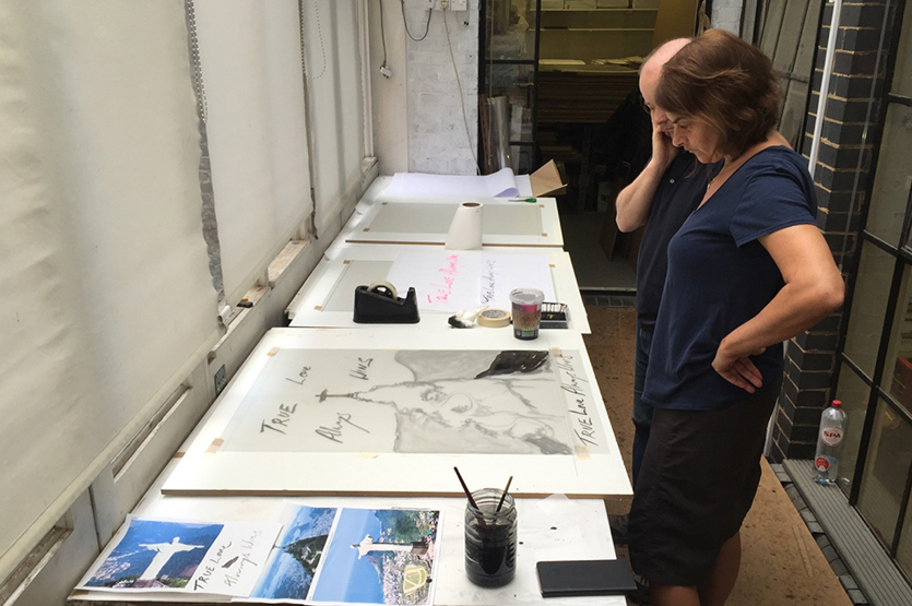 Tracey creates the original artwork at Paupers Press, referencing images of 'Christ the Redeemer'
